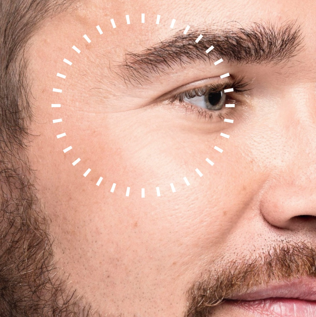 Nahaufnahme einer männlichen Augenpartie mit markiertem Bereich um das Auge zur Darstellung von Hauttextur und Feuchtigkeit.
